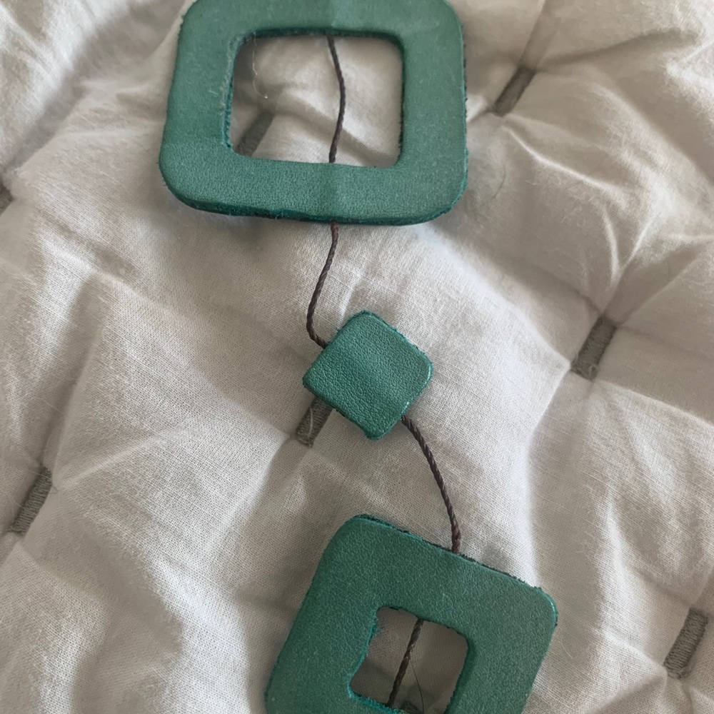 Gorgeous green leather necklace.